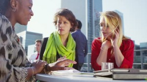 stock-footage-cheerful-and-attractive-group-of-business-women-having-an-informal-meeting-on-office-terrace-on-a